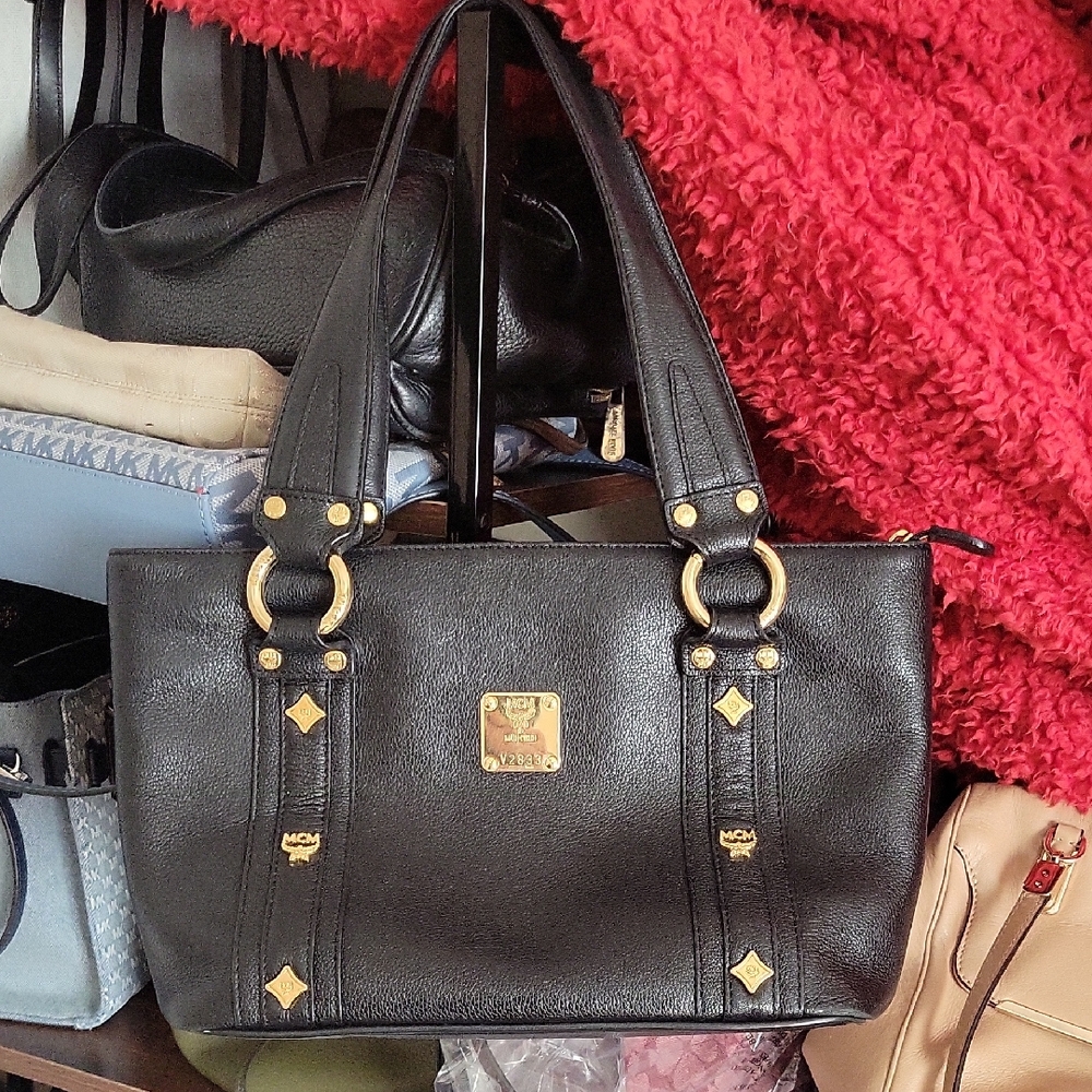 MCM Black Leather Shoulder Bag with Gold Accents